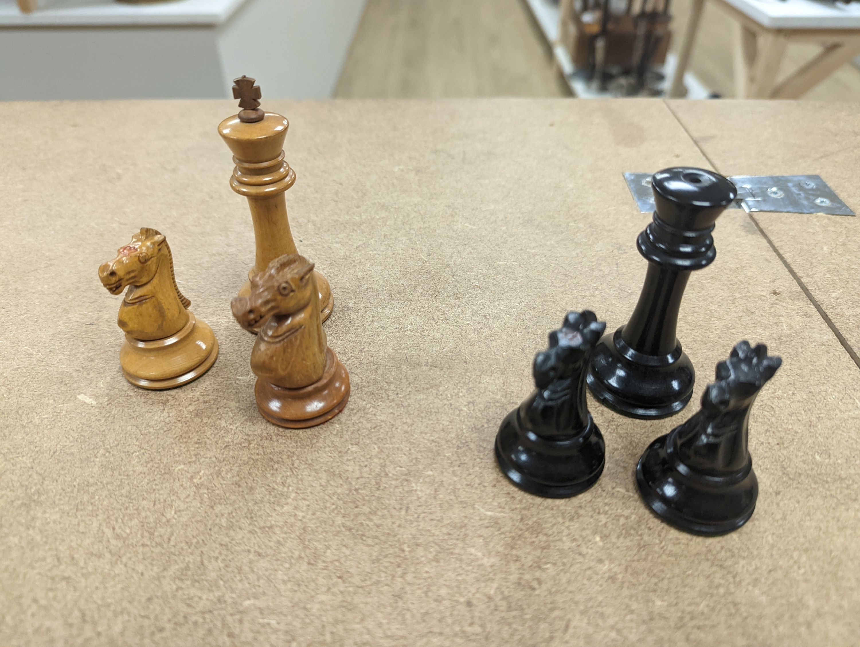A Staunton chess set, some associate pieces and a miniature chess set. King height - 9cm